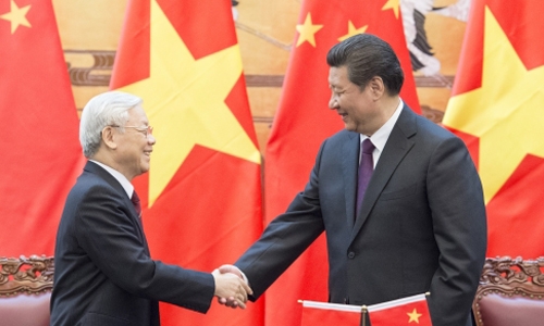 1 Chủ tịch Trung Quốc Tập Cận Bình (phải) đón tiếp